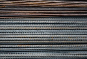 construction-steel-reinforcement-closeup-selective-focus-warehouse-building-materials-repair-construction-buildings-houses_166373-3679